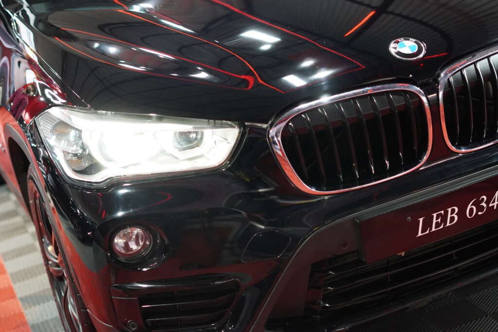 White BMW M5 in black color